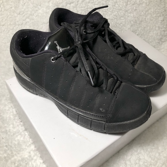 all black jordans low top